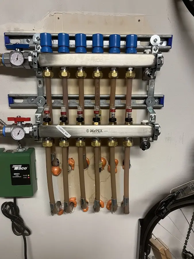 Plumber performing Water Heater Repair at a residential property in Monmouth Beach